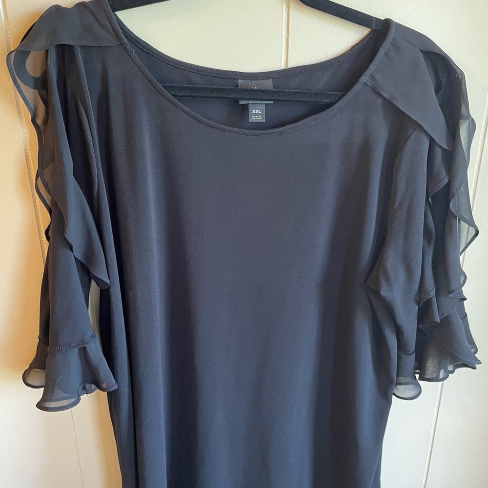 Cold shoulder blouse.